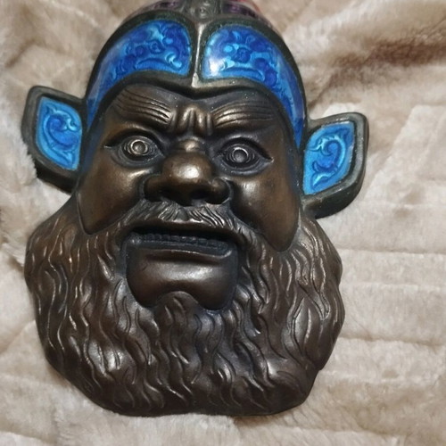 Small decorative wall hanging in three colors like new