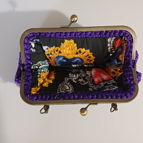 Knitted clutch bag like new, purple with gold details