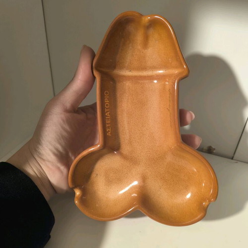 Ashtray with funny shape like new