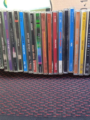 Foreign CDs used, pack of 25 with blues, jazz, latin, rock, soundtrack