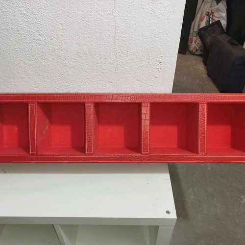 Shelf with red leather upholstery used, 5 compartments for CDs