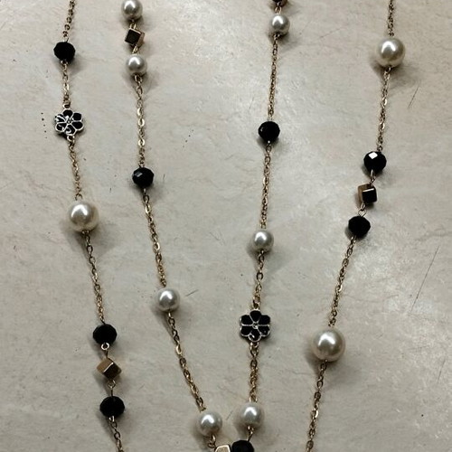 Stainless steel necklace new with pearls and black stones