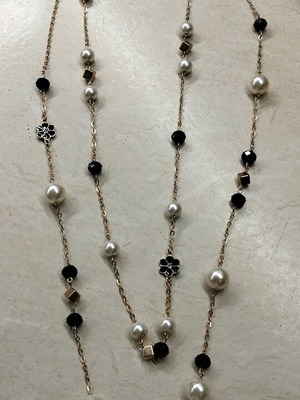 Stainless steel necklace new with pearls and black stones