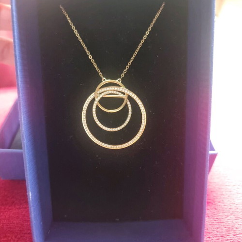 Swarovski necklace like new, gold color