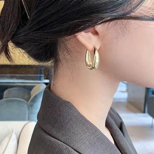 Classic copper alloy earrings gold color, new, size 24x18mm