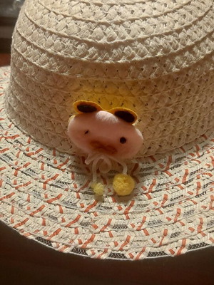 Girls hat ecru like new with red stripes and pink teddy bear