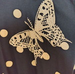 Black oversized t-shirt with gold/beige polka dots and butterflies like new