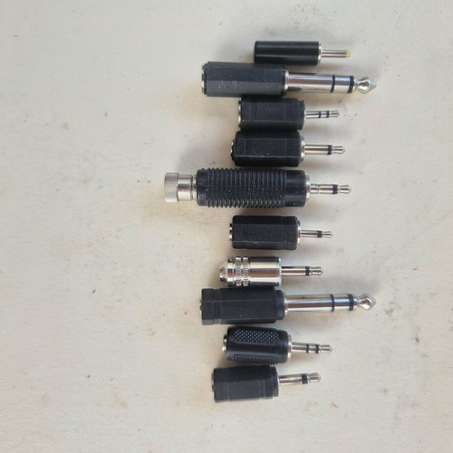 Adjustable power chargers with various plugs for electronics and laptops