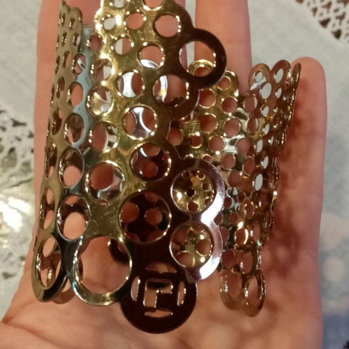 Vintage cuff bracelet with perforated design Paco Rabanne Lady Million used