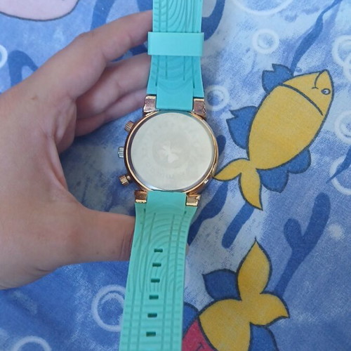Mulco wristwatch turquoise and gold, used with minor wear