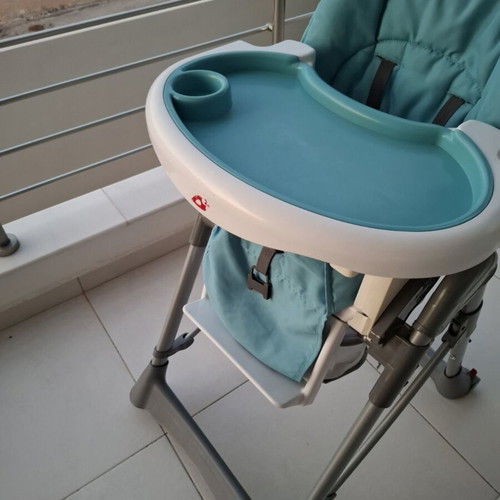 Prenatal high chair used, blue with rear wheels