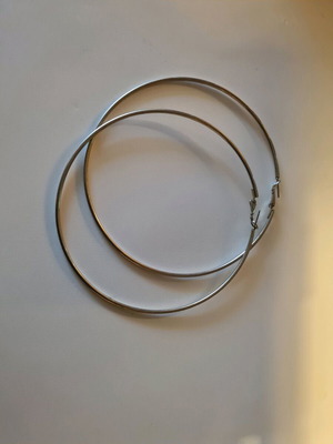 Large hoop earrings used, silver
