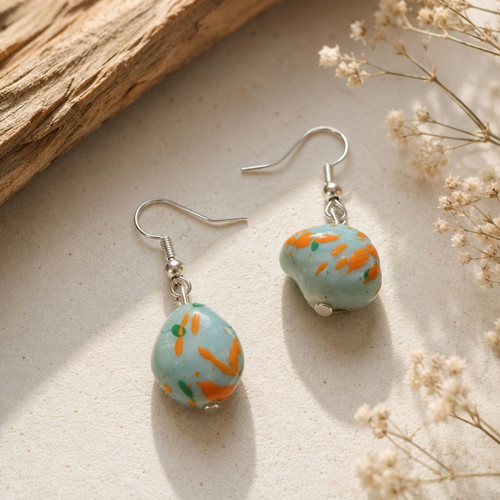 Little Matisse handmade statement earrings with turquoise and orange beads