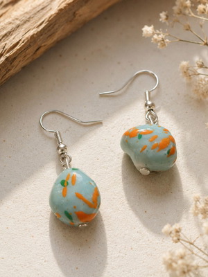 Little Matisse handmade statement earrings with turquoise and orange beads