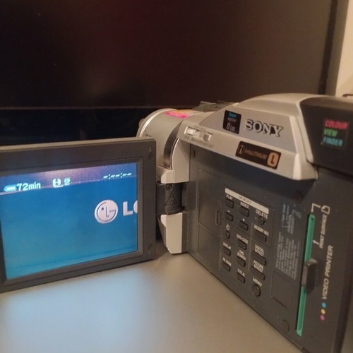 Sony Handycam DCR-TRV820E digital video camera used with printer, battery, charger
