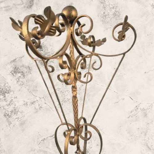 Metal coat rack used, elegant gold finish