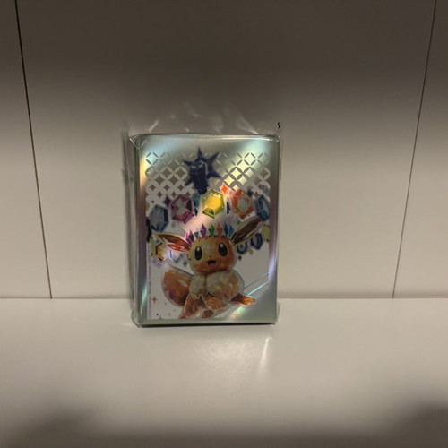Pokemon card sleeves, 11 packs from different sets