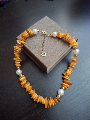 Short necklace with irregular orange corals, pearls and stainless steel clasp, new