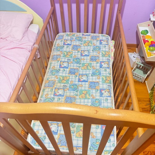 Baby cot used with mattress from coconut fiber
