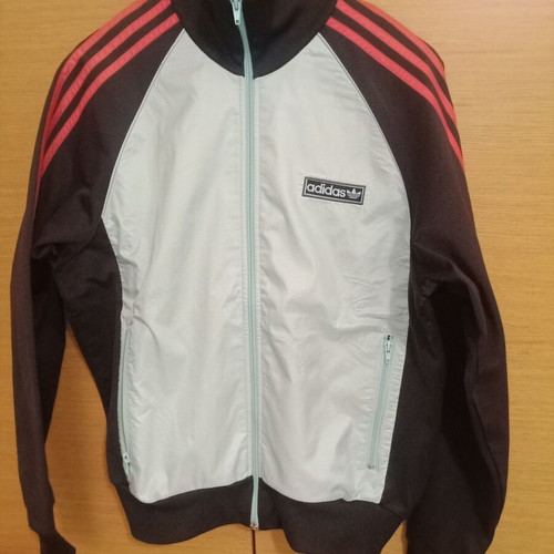 Adidas jacket used, light blue with red stripes, size L