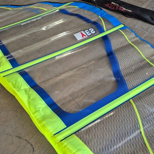 Windsurfing full set with board, sails, masts, booms, and accessories