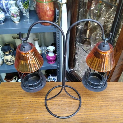 Tabletop candlestick with double bases like new, metal stand