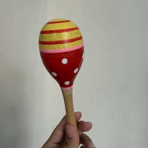Wooden children's musical instrument used with paint wear