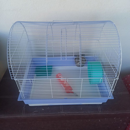 Hamster cage used, with cleaning drawer