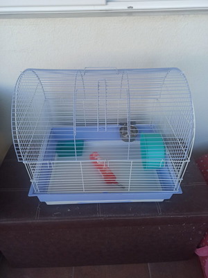 Hamster cage used, with cleaning drawer