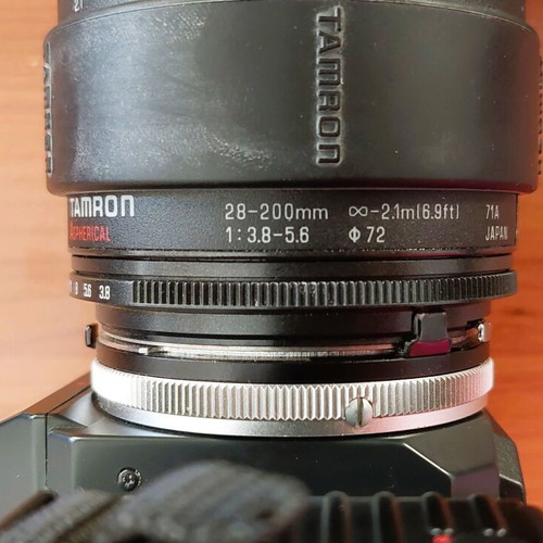Canon T70 film camera with 2 lenses, flash and case like new