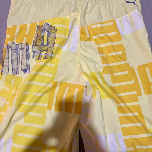Puma men's yellow swim shorts, new