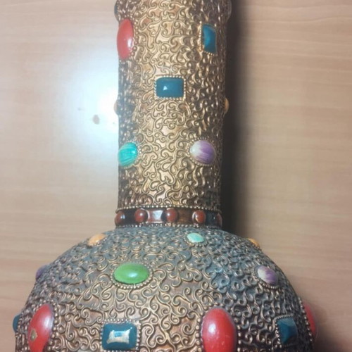 Handmade vase from Peru used with 56 different stones