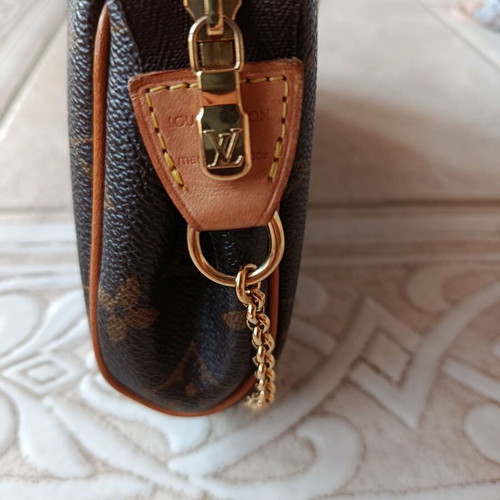 Louis Vuitton Eva Pochette bag like new, Monogram canvas, brown