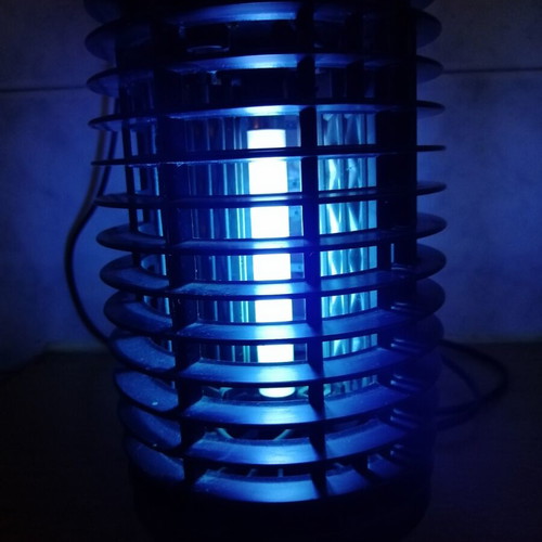Electric insect trap used, black color, fully functional