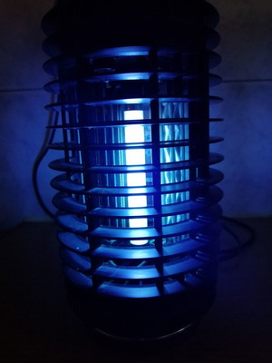 Electric insect trap used, black color, fully functional