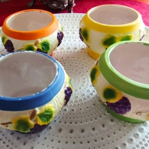 Ceramic cactus pots set of 4 like new, different colors