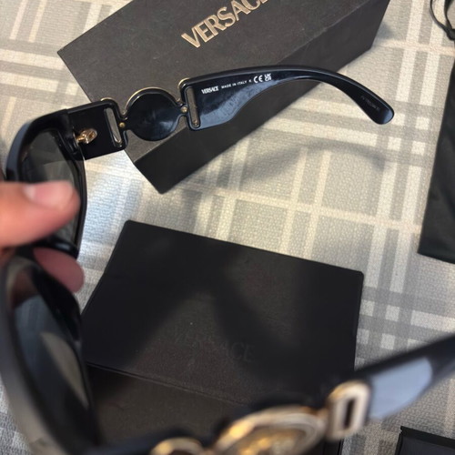Versace sunglasses for women like new, black and gold