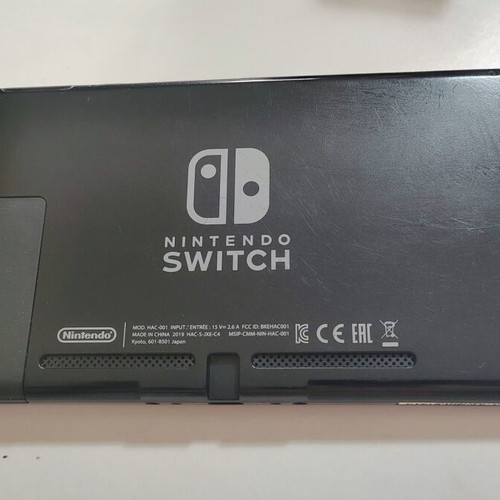 Nintendo Switch console with accessories and carrying case