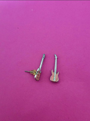 Guitar stud earrings like new, hypoallergenic pink steel
