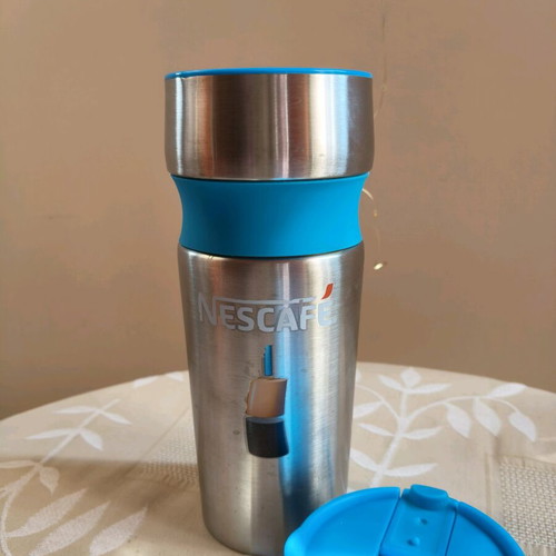 Nescafe Thermos like new with blue non-slip handle