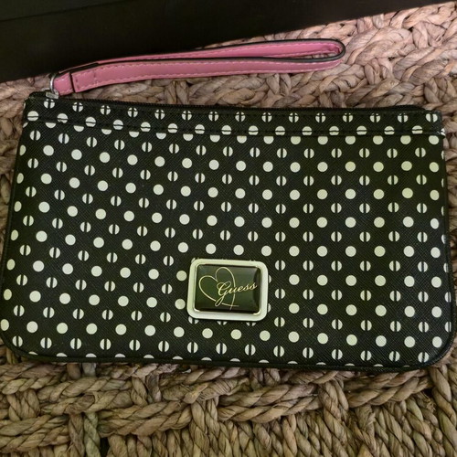 Guess women's backpack like new with gift pouch, black and gray