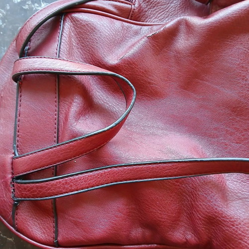 Women's burgundy backpack bag used