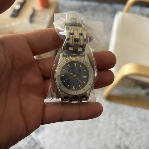 Ellesse wristwatch, gold and silver, needs hand repair