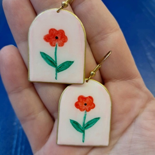Handmade clay earrings hanging, hand-painted like new