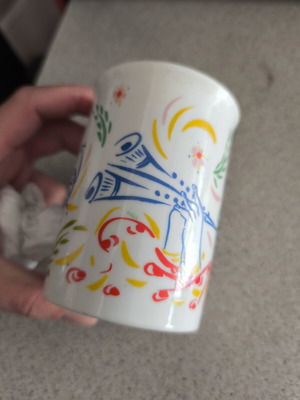 Porcelain mug like new with colorful design