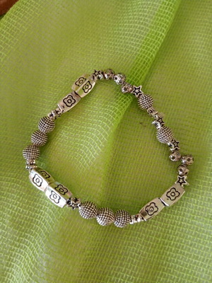 Grey bracelet with assorted beads