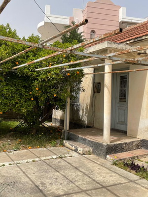οικόπεδο εντός σχεδίου επί ασφαλτοστρωμένου δρόμου συνολικής έκτασης 1.077,13 τμ