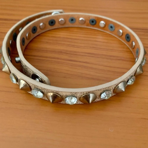 Bracelet with studs and transparent stones like new, beige and silver
