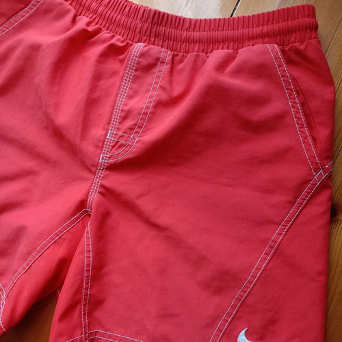 Nike men's swim shorts used, size L fits XS-S, red and white
