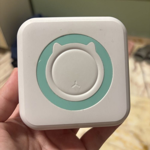 Mini printer like new with 6 rolls, cable and box